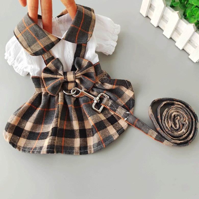 Sweet plaid dress for dogs with a collar and a bow,dress have towing leash for going out.