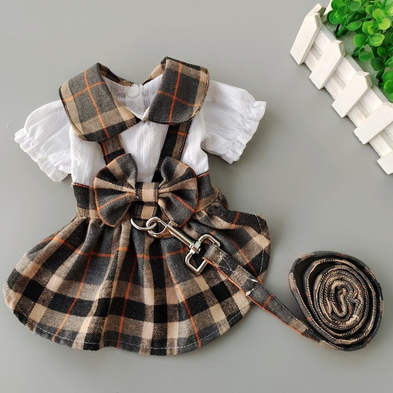 Sweet plaid dress for dogs with a collar and a bow,dress have towing leash for going out.