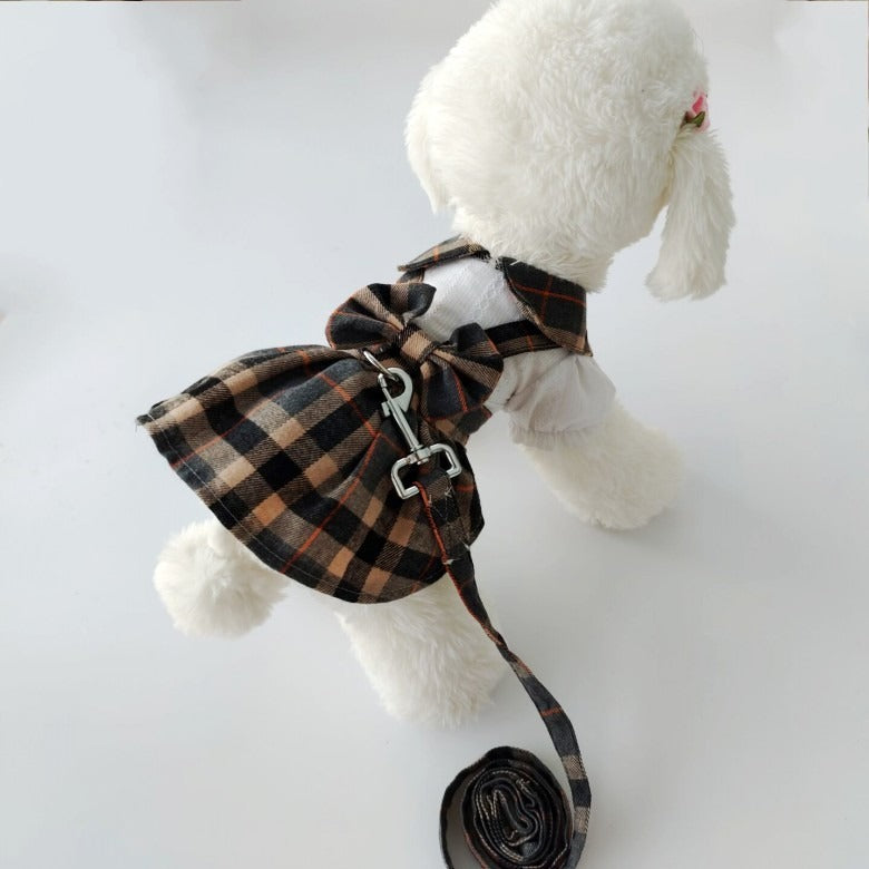 Sweet plaid dress for dogs with a collar and a bow,dress have towing leash for going out.