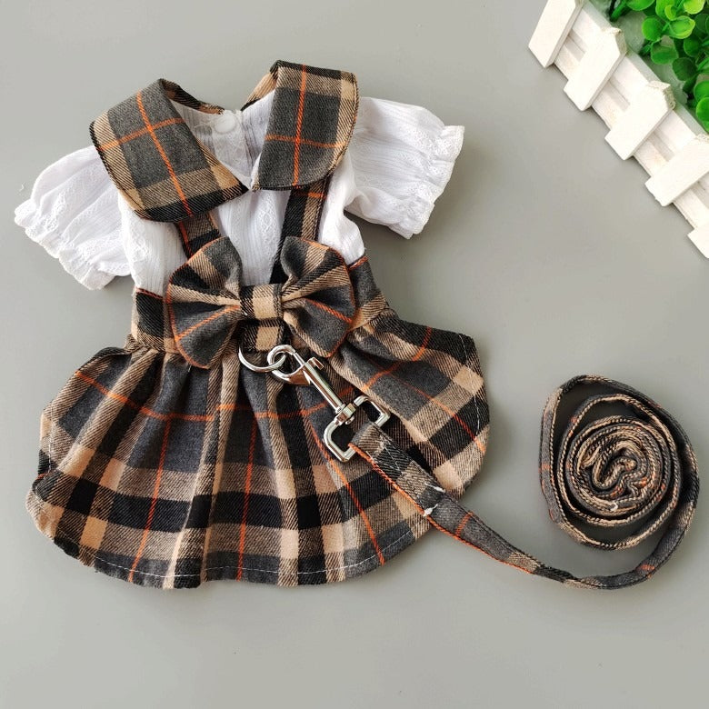 Sweet plaid dress for dogs with a collar and a bow,dress have towing leash for going out.